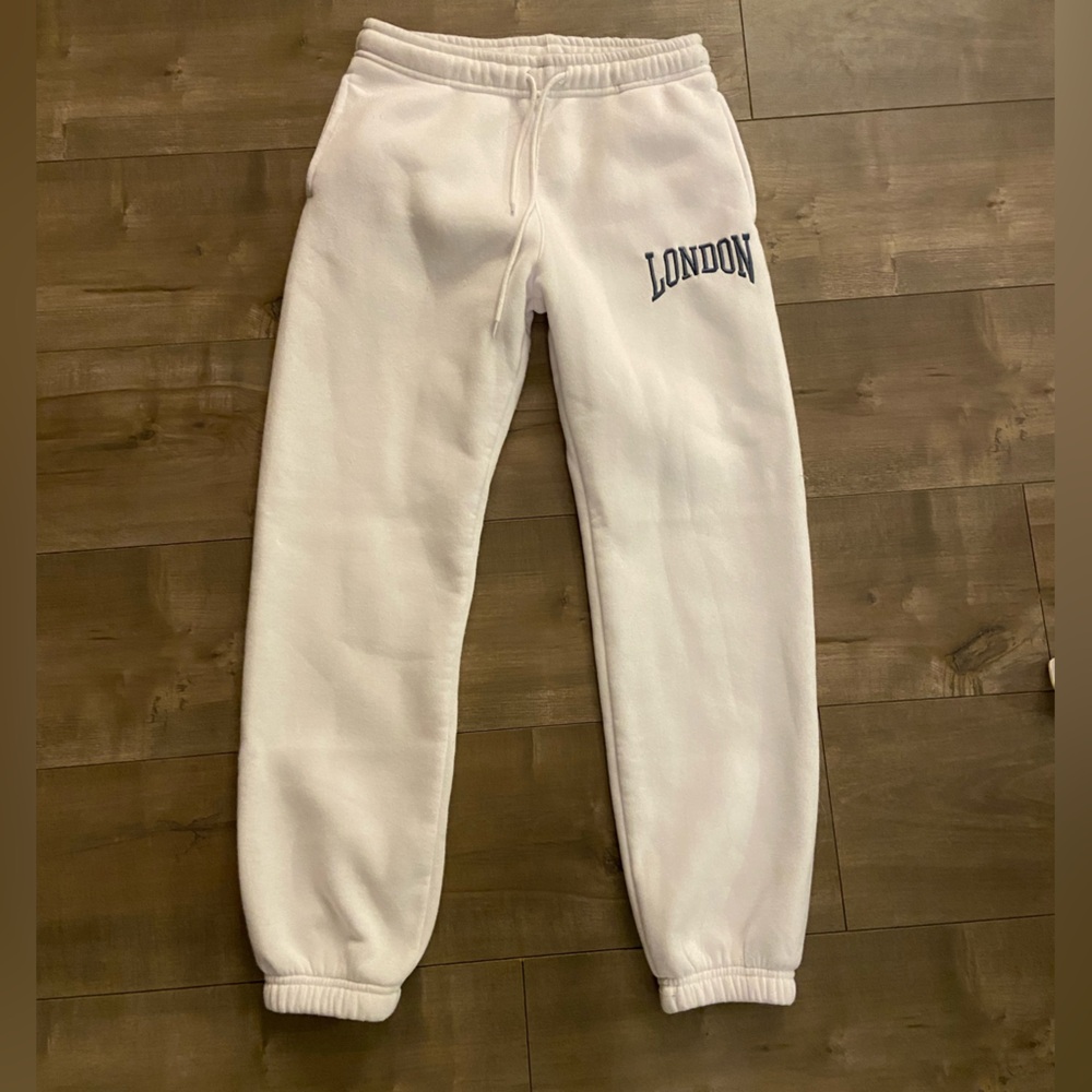 Selling white sweat pants. Stain free. Size Small.